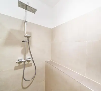Ein Badezimmer in der Unterkunft Design Apartment mit kostenfreiem Garagen Parkplatz im Zentrum