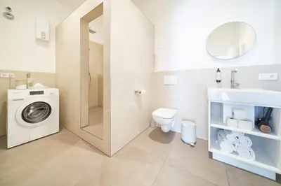 Ein Badezimmer in der Unterkunft Design Apartment mit kostenfreiem Garagen Parkplatz im Zentrum