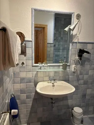 Ein Badezimmer in der Unterkunft Ferienwohnung Zur Scheune