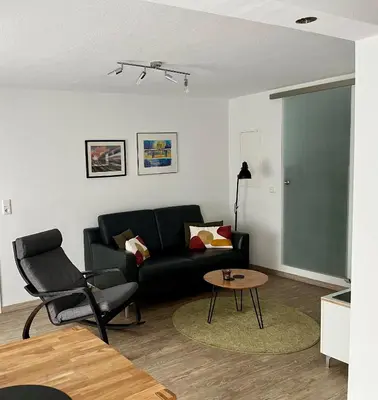 Ein Sitzbereich in der Unterkunft Ferienwohnung Im Stiffje