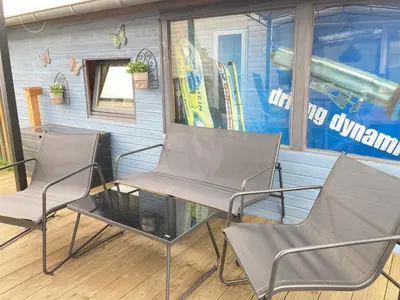 Ein Sitzbereich in der Unterkunft Ring Chalet