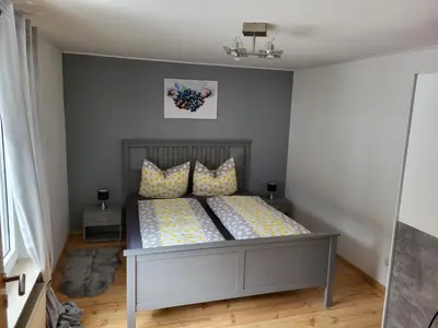 Ein Bett oder Betten in einem Zimmer der Unterkunft Haus Mika