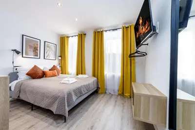 Ein Bett oder Betten in einem Zimmer der Unterkunft VonMos Moselblick Apartments