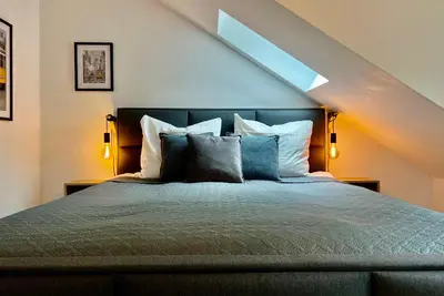Ein Bett oder Betten in einem Zimmer der Unterkunft VonMos Panorama Apartments