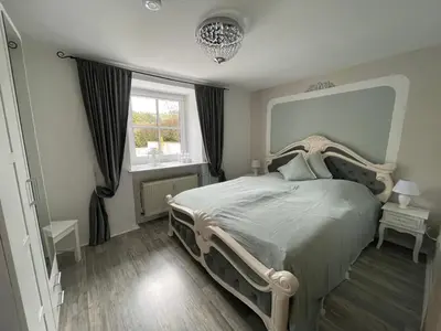 Ein Bett oder Betten in einem Zimmer der Unterkunft Villa Maaremonte
