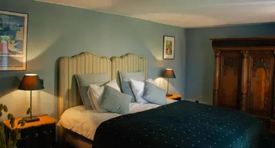 Ein Bett oder Betten in einem Zimmer der Unterkunft Gutshaus De La Fontaine