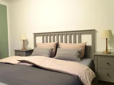 Ein Bett oder Betten in einem Zimmer der Unterkunft Ferienwohnung Haus Weinbergsblick
