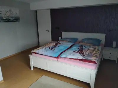 Ein Bett oder Betten in einem Zimmer der Unterkunft Ferienwohnung Bussard