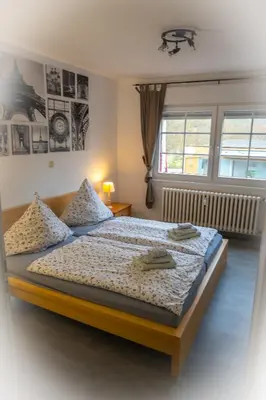 Ein Bett oder Betten in einem Zimmer der Unterkunft Fewo am Steinbrunnen