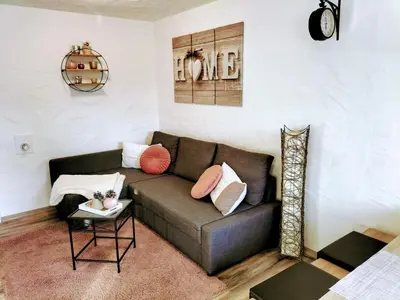 Ein Sitzbereich in der Unterkunft Ferienwohnung Schneider