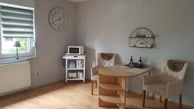 Ein Sitzbereich in der Unterkunft Ferienwohnung Pees
