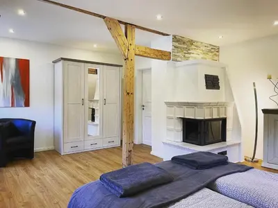 Ein Bett oder Betten in einem Zimmer der Unterkunft Altes Winzerhaus am Moselufer - Klosterberg