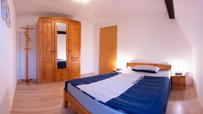 Ein Bett oder Betten in einem Zimmer der Unterkunft Fewo Thielke Fewo 1 Reichsburg