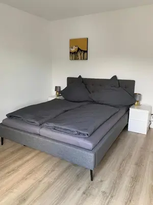 Ein Bett oder Betten in einem Zimmer der Unterkunft Moselflair