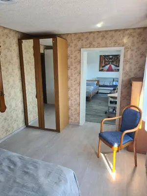 Ein Bett oder Betten in einem Zimmer der Unterkunft Monteurwohnung Fremdenzimmer mit WLAN, Garten, Parkplatz, eigener Terrasse