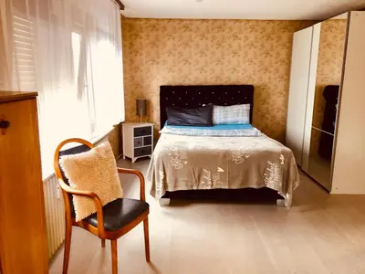 Ein Bett oder Betten in einem Zimmer der Unterkunft Monteurwohnung Fremdenzimmer mit WLAN, Garten, Parkplatz, eigener Terrasse