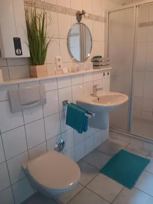 Ein Badezimmer in der Unterkunft Ferienwohnung Mattheiser Weiher