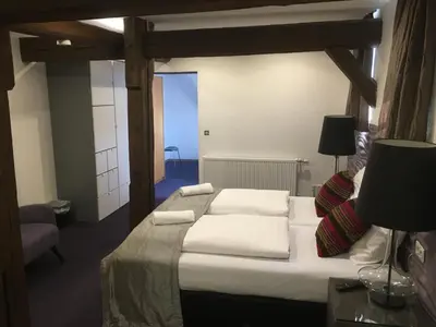 Ein Bett oder Betten in einem Zimmer der Unterkunft Hotel Lekker