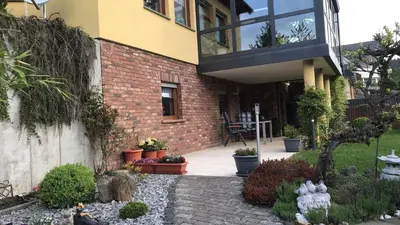 Ein Garten an der Unterkunft Ferienwohnung Le