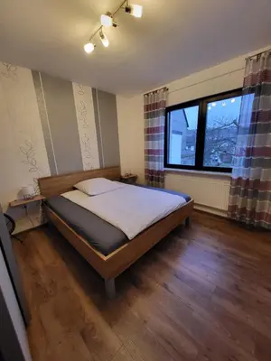 Ein Bett oder Betten in einem Zimmer der Unterkunft Ferienhaus Leo