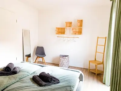 Ein Bett oder Betten in einem Zimmer der Unterkunft Home away from Home in a lovely vine region Bingen
