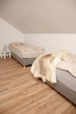 Ein Bett oder Betten in einem Zimmer der Unterkunft Overkamps - das Ferienhaus Odernheim