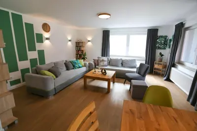 Ein Sitzbereich in der Unterkunft Rieslingresidenz