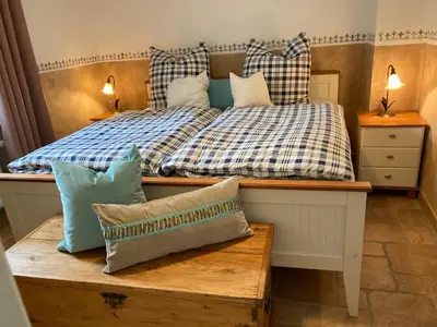 Ein Bett oder Betten in einem Zimmer der Unterkunft Ferienwohnung Fröhlich