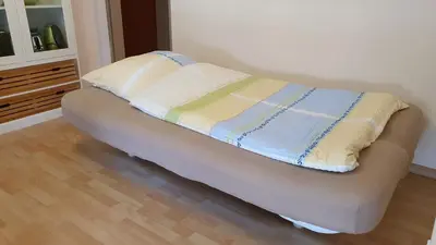 Ein Bett oder Betten in einem Zimmer der Unterkunft Ferienwohnung im Moseltal