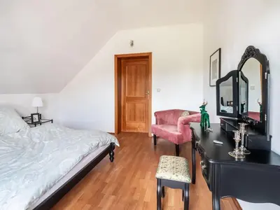 Ein Bett oder Betten in einem Zimmer der Unterkunft Luxurious holiday home with a nice private garden