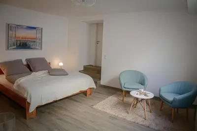 Ein Bett oder Betten in einem Zimmer der Unterkunft Ferienwohnung Viventum34