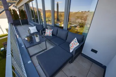 Ein Balkon oder eine Terrasse in der Unterkunft Mittelmosel Panorama Ferienwohnung