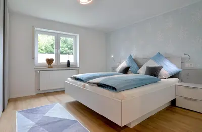Ein Bett oder Betten in einem Zimmer der Unterkunft Kleine-Eifel-Auszeit