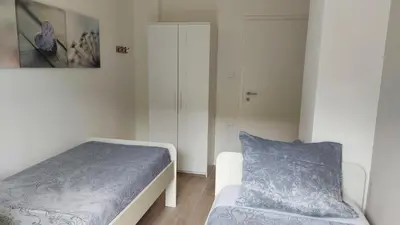 Ein Bett oder Betten in einem Zimmer der Unterkunft Villa Bad Bertrich