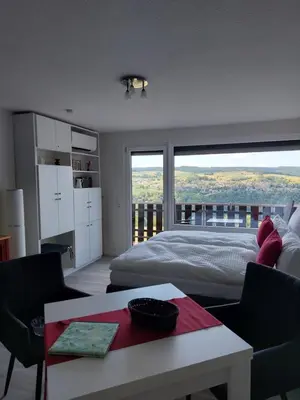 Ein Bett oder Betten in einem Zimmer der Unterkunft Loreley Lounge II
