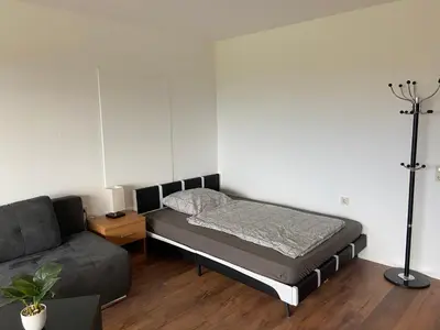 Ein Bett oder Betten in einem Zimmer der Unterkunft B1107, Schönes Appartement mit Traumblick