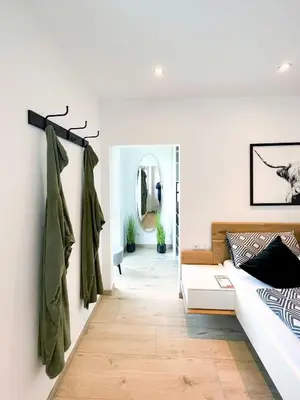 Ein Bett oder Betten in einem Zimmer der Unterkunft The View Suite