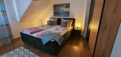 Ein Bett oder Betten in einem Zimmer der Unterkunft Haus Charlotte