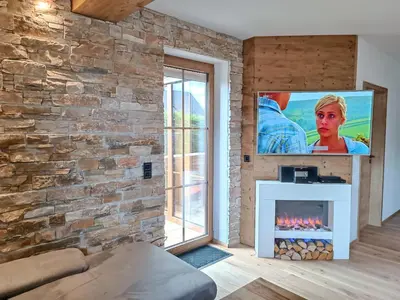 TV/Unterhaltungsangebot in der Unterkunft Luxus Ferienwohnung Chalet Seenähe