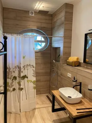 Ein Badezimmer in der Unterkunft Bergs Bahnhof