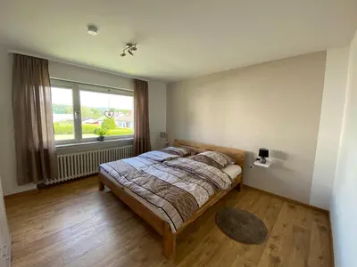 Ein Bett oder Betten in einem Zimmer der Unterkunft Ferienwohnung Steinstraß Nähe Nürburgring