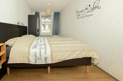 Ein Bett oder Betten in einem Zimmer der Unterkunft Der Eifel Perle Manderscheid