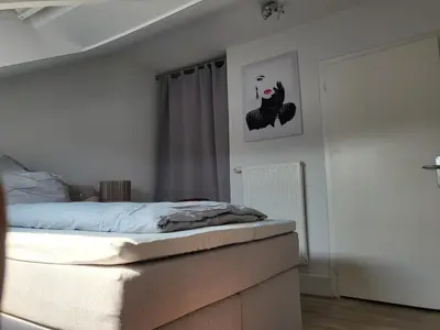 Ein Bett oder Betten in einem Zimmer der Unterkunft Lounge 5 Singleapartment