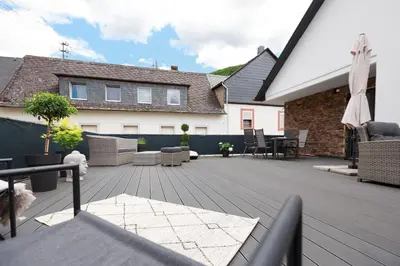 Ein Sitzbereich in der Unterkunft Geräumige Mosel-FeWo für die ganze Familie - Große Dachterrasse - Netflix - Waschmaschine & Trockner