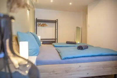 Ein Bett oder Betten in einem Zimmer der Unterkunft Stilvolle Wohnung bei Cochem - 2 Schlafzimmer