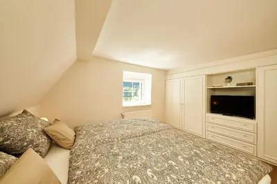 Ein Bett oder Betten in einem Zimmer der Unterkunft Villa Moselle