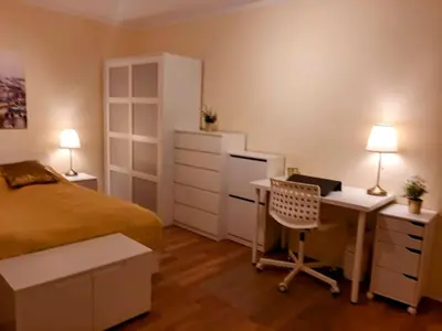 Ein Bett oder Betten in einem Zimmer der Unterkunft Schöne Ferienwohnung mit Balkon und Garten