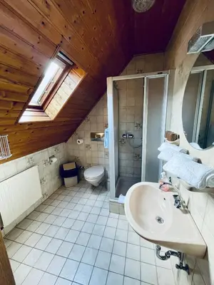 Ein Badezimmer in der Unterkunft Hotel Pension Balthasar