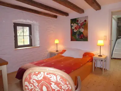 Ein Bett oder Betten in einem Zimmer der Unterkunft Ferienhaus am Eifelsteig