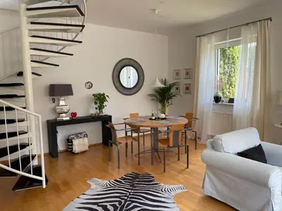 Ein Sitzbereich in der Unterkunft Am Apfelbaum, ein Ferienhaus zwischen Rhein und Mosel